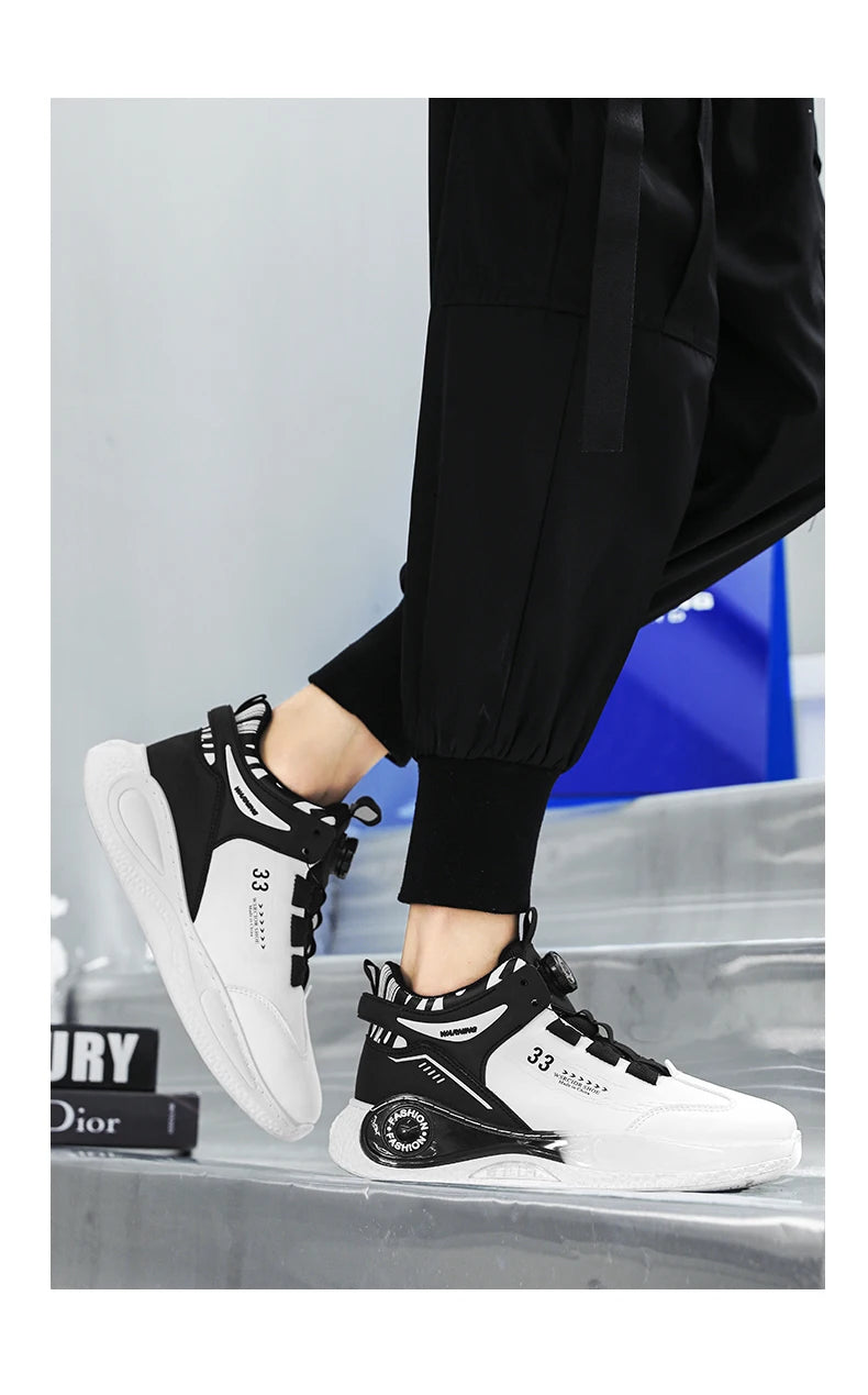 Pair of men's white and black sneakers with chunky sole and lace-up design