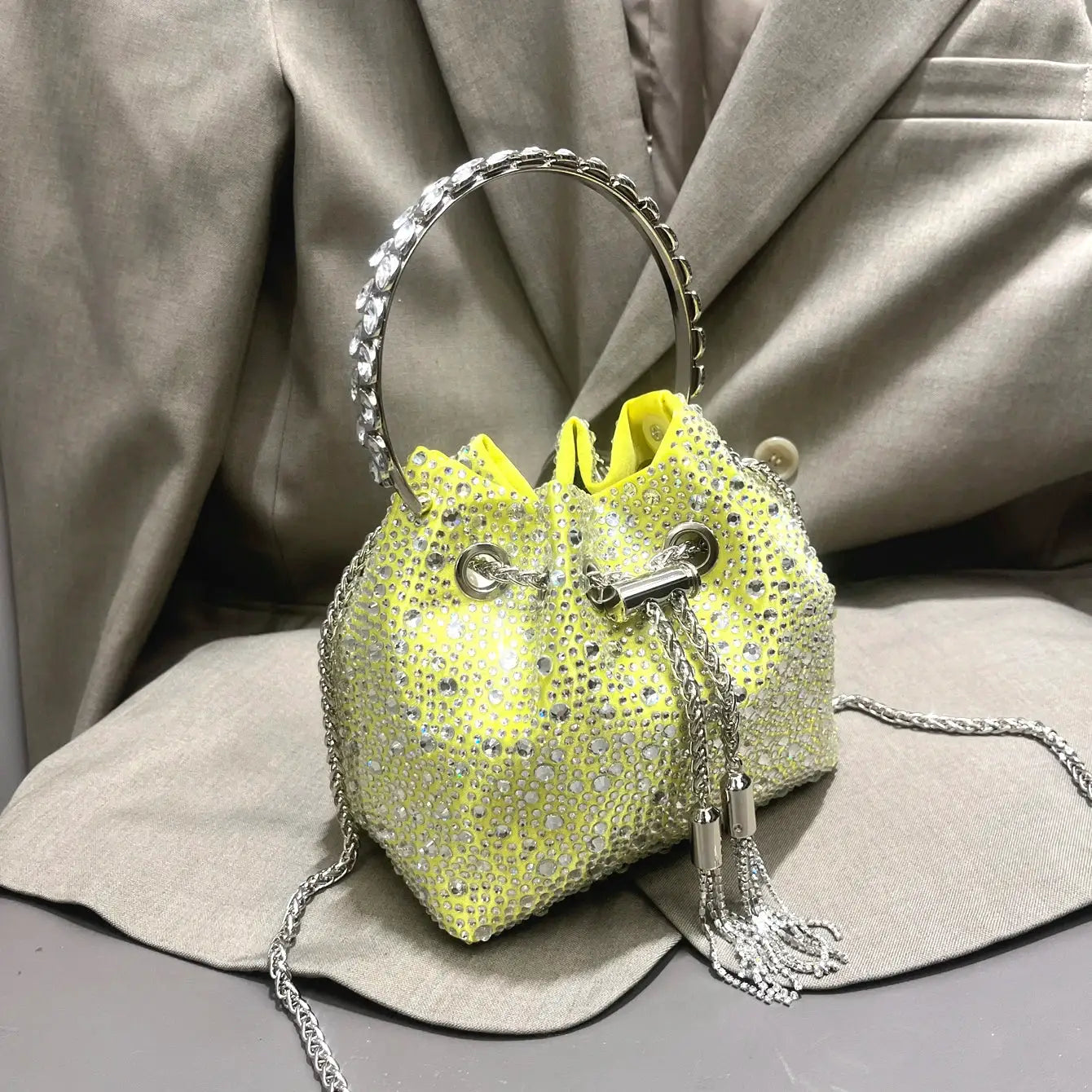 Simples Market rhinestone bucket clutch, yellow crystal-covered handbag with circular crystal handle