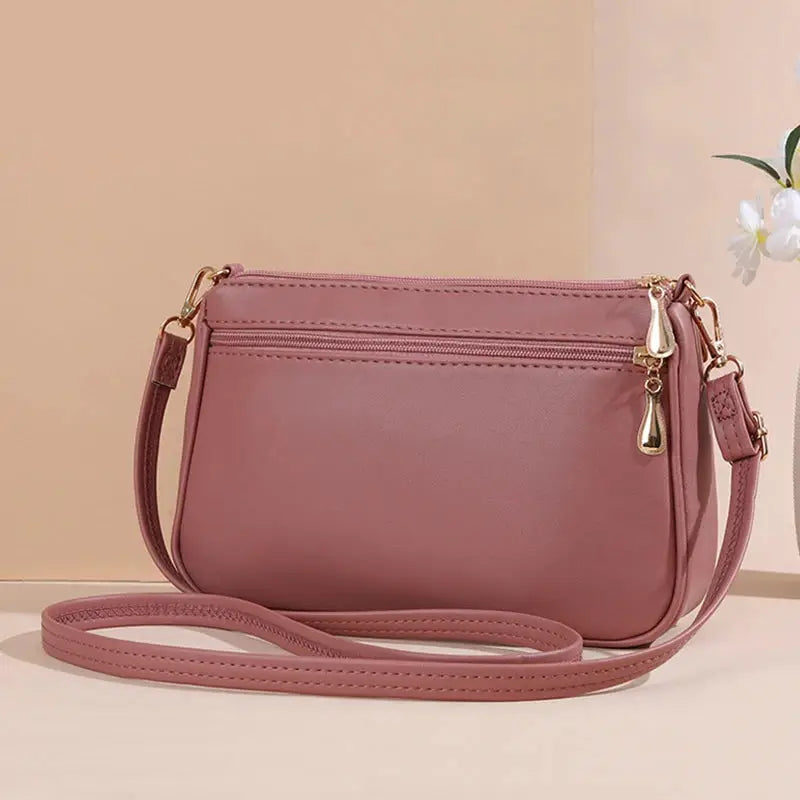 PU leather crossbody bag in pink by Simples Market