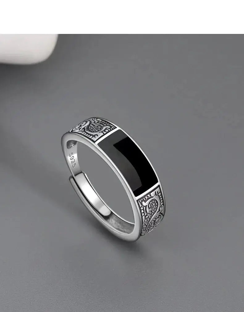 Men's 925 sterling silver ring with black zircon inlay and ornate engraved shoulders