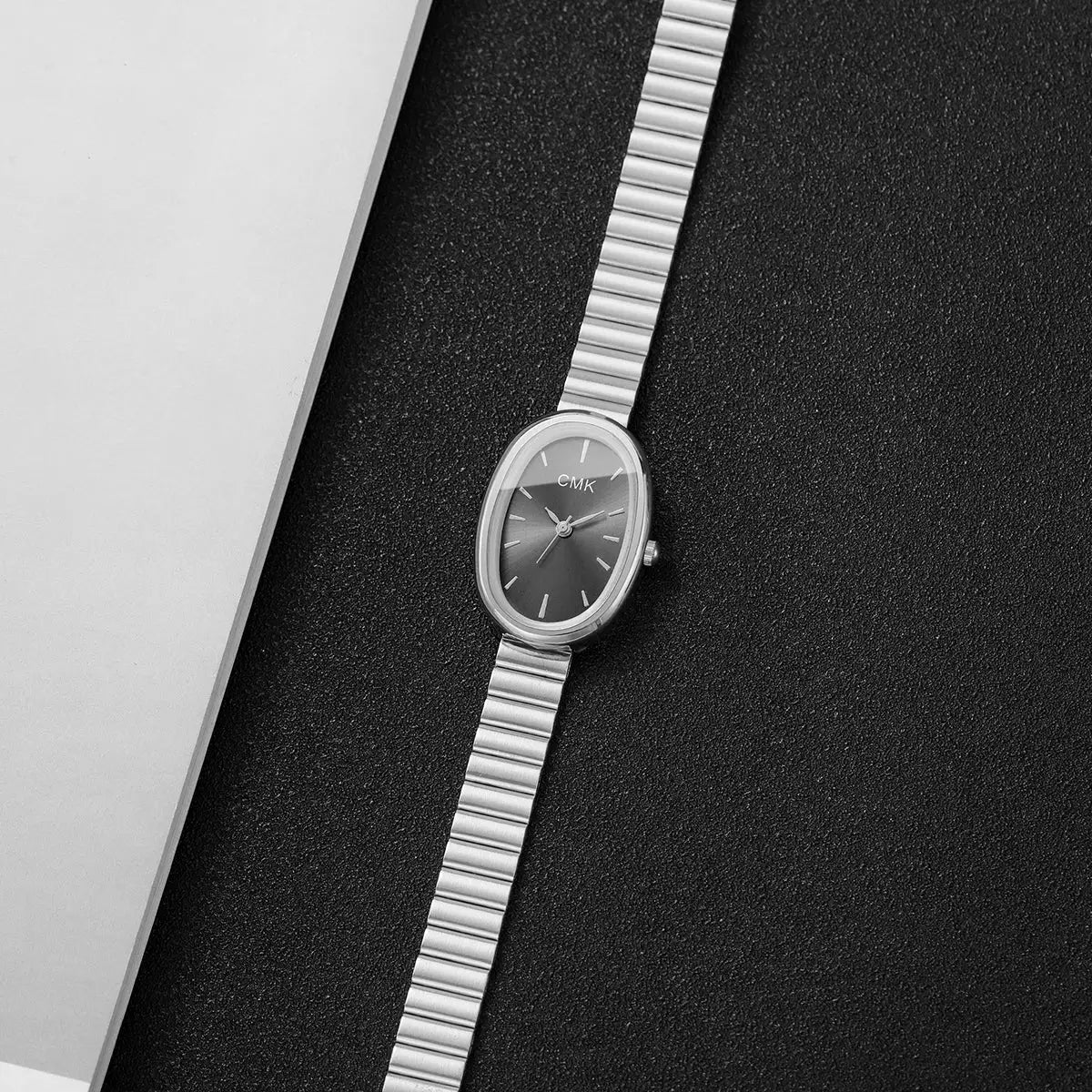 Simples Market CMK oval-dial silver-toned women's quartz wristwatch with ultra-thin metal strap