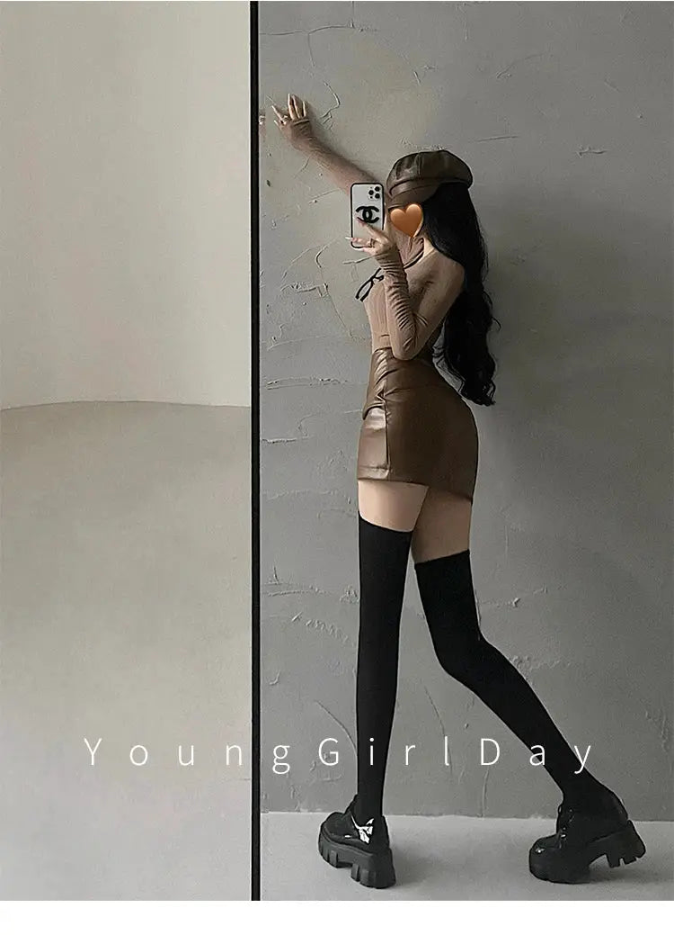 WOMENGAGA PU leather high-waist A-line mini skirt in brown with wrinkle wrap detail