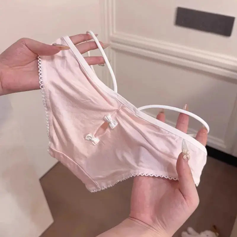 Pink SP&CITY Lolita lace underwear for women, low-rise cotton panties with bows and delicate trim.