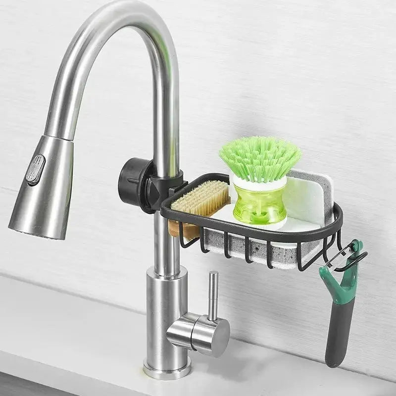 Shower rack faucet-mounted storage rack in silver aluminum with soap dish, sponge and brush holder.
