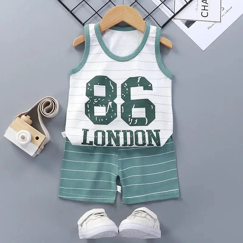 Two-piece children's sleeveless vest set with white top, green trim, striped shorts, 86 London, cotton, Simples Market