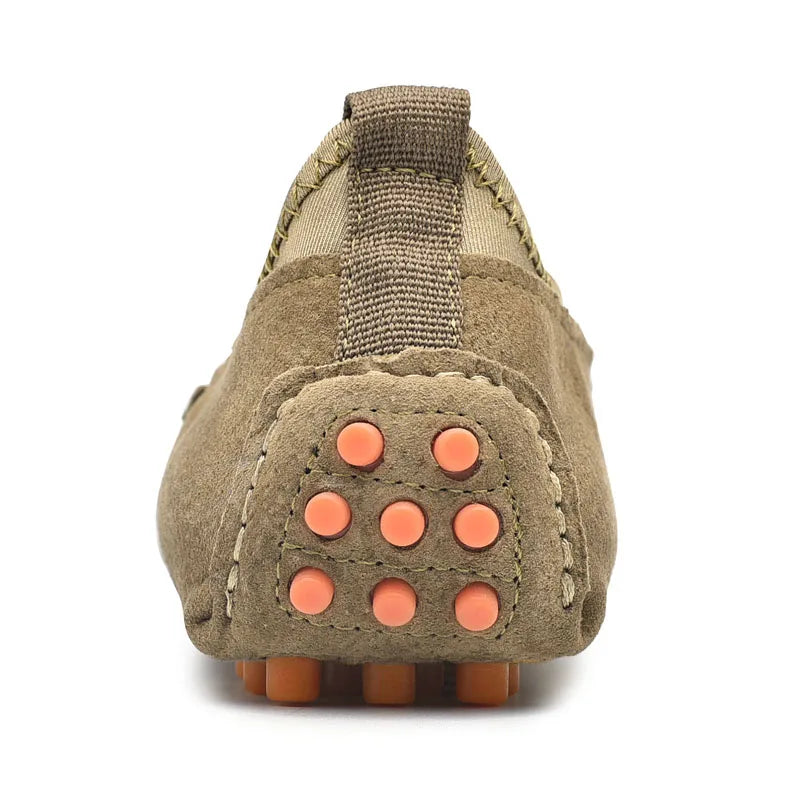 Men's driving shoes in brown suede with orange outsole studs and heel pull tab