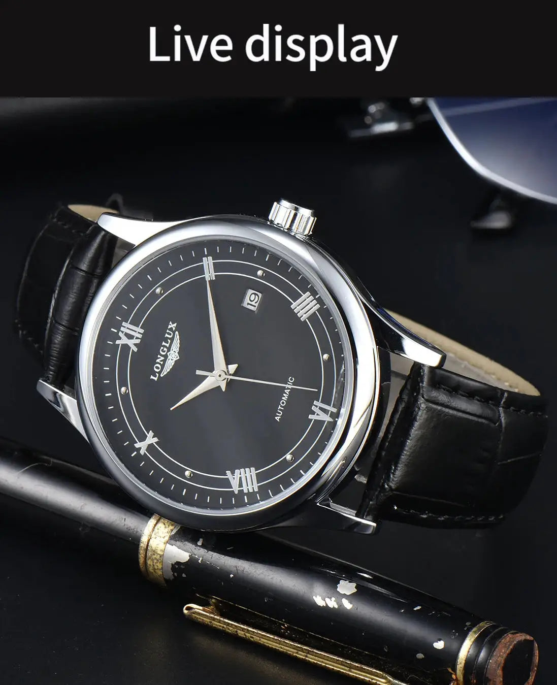 LONGLUX automatic men's wristwatch with black dial, silver case, and black leather strap, date window at 3 o'clock.
