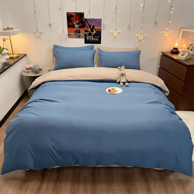 Duvet cover set for double/queen bed in blue with matching pillowcases.