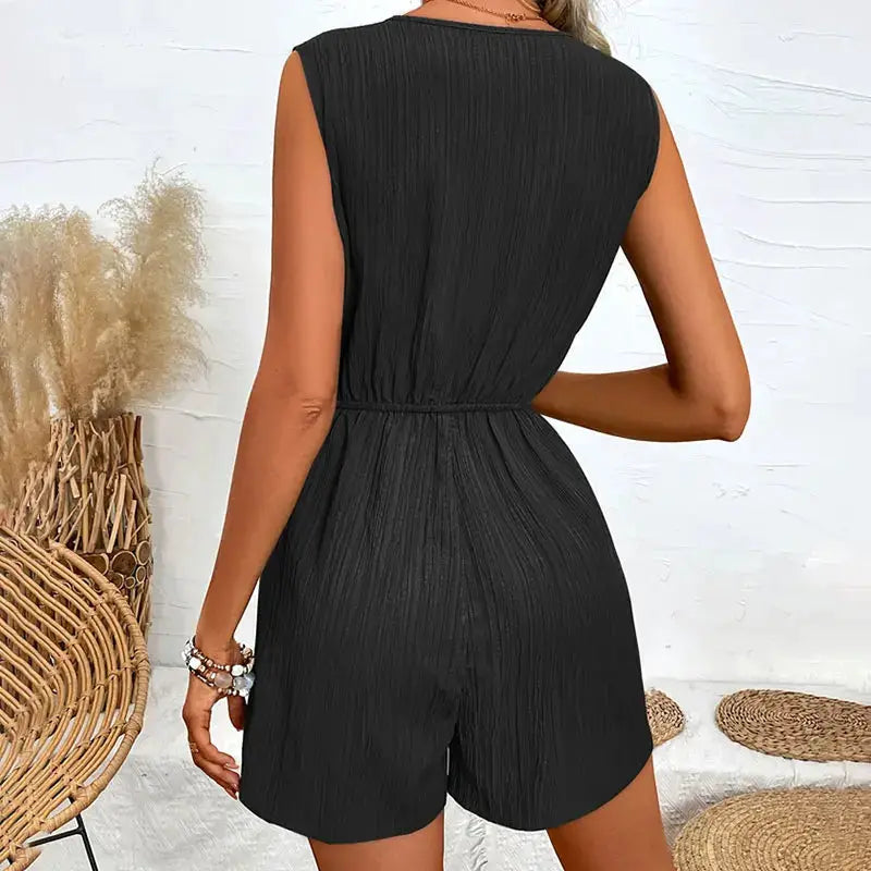 Romper for women by Simples Market; black sleeveless short playsuit with waist cinch and crinkled fabric