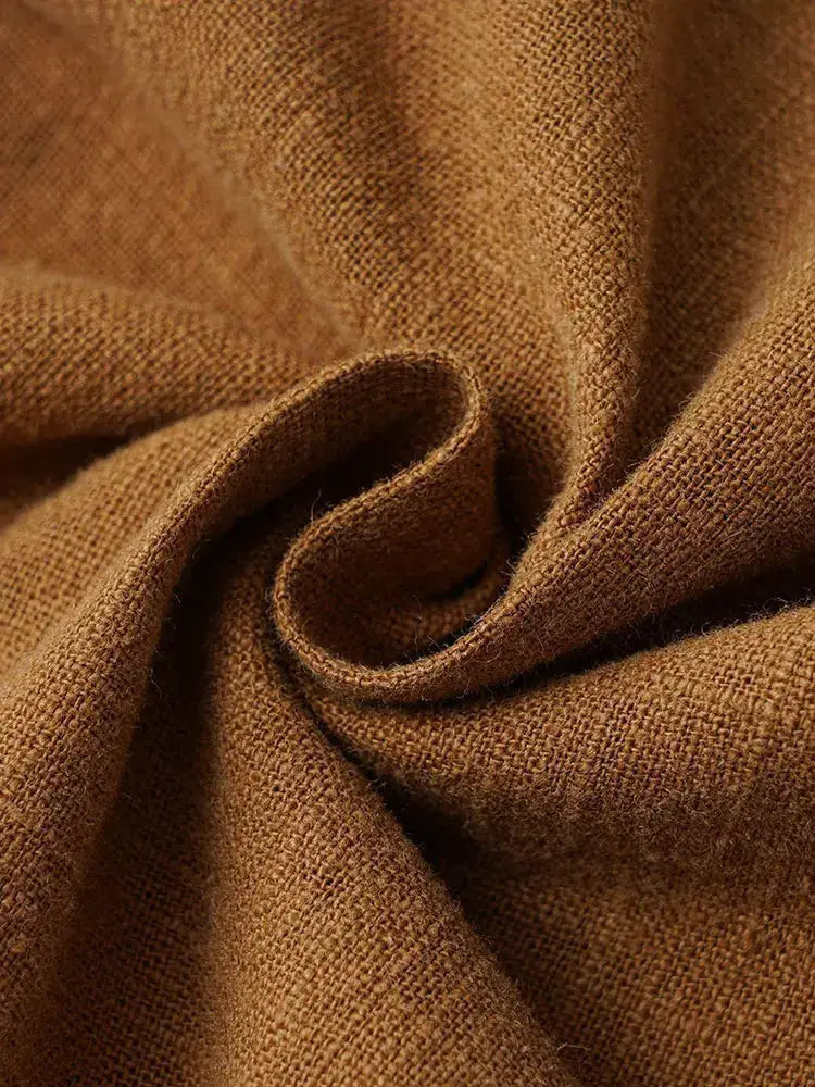 Casual cotton-linen chino pants fabric close-up in brown