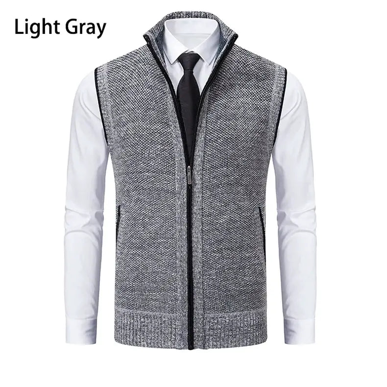 Men's light gray knit sleeveless vest with stand collar and front zipper.