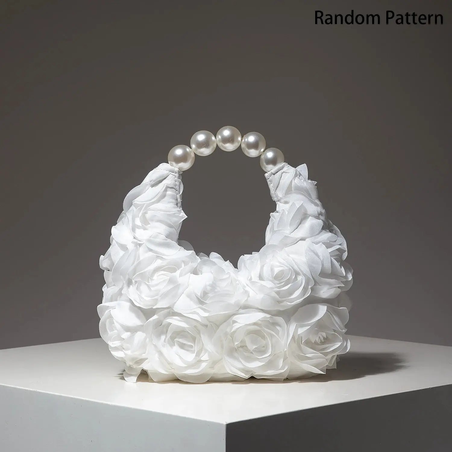 White floral rosette clutch with pearl bead handle, elegant evening bag
