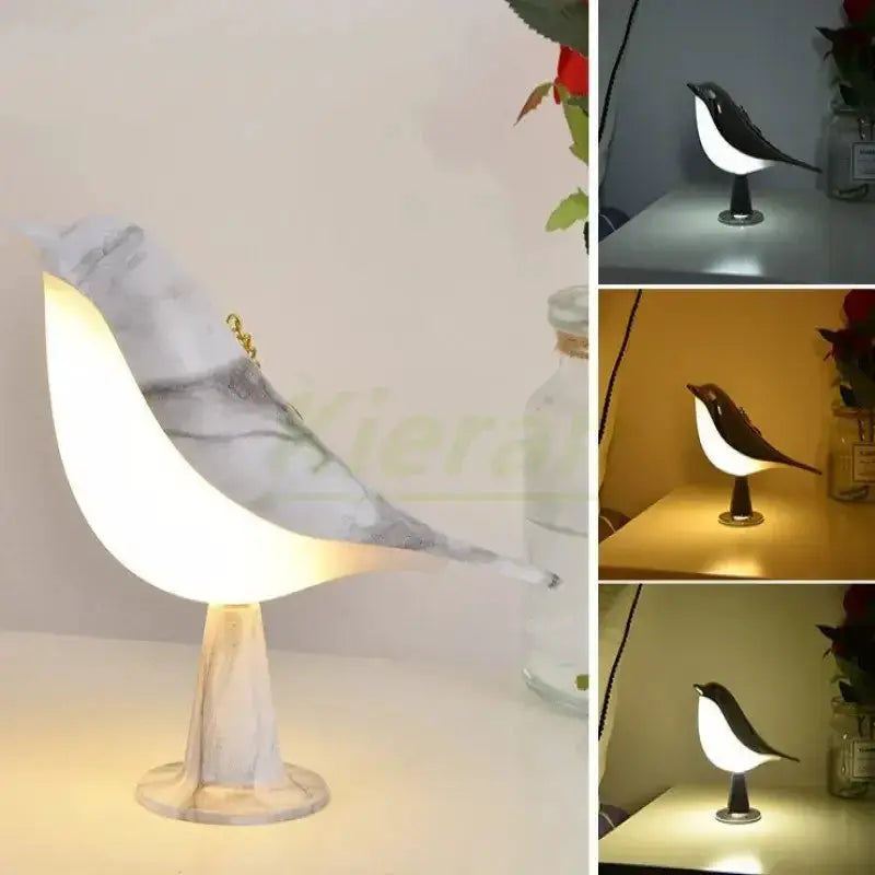 Nordic Magpie LED desk lamp in white bird form on a marble pedestal with warm ambient light