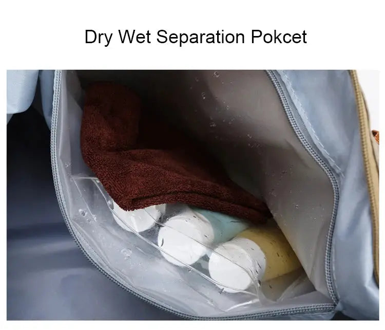 Travel gym bag with dry-wet separation pocket, light blue exterior; interior shows towel and bottles.