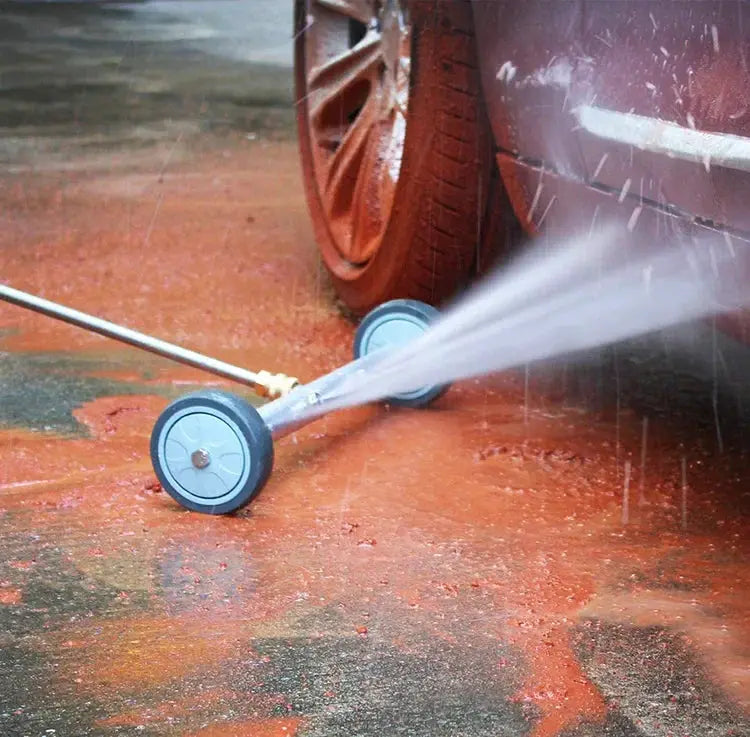 Simples Market car wash water broom with blue wheels and two extension rods, spraying water near a car