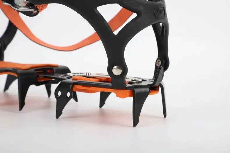 Simples Market 12-Tooth Ice Snow Crampons with orange base and black frame, stainless steel spikes.