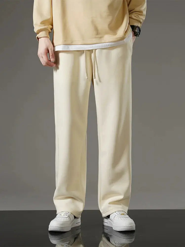 Spring Autumn Men Sweatpants by Simples Market in cream cotton with drawstring, wide-leg casual track pants.