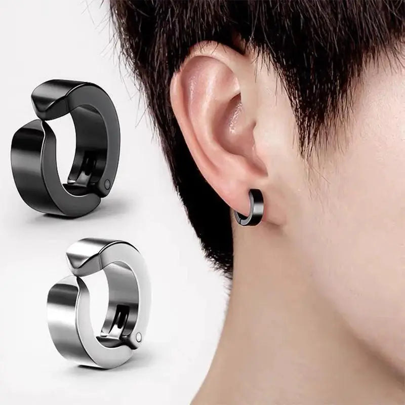 2-pack stainless steel ear clip earrings in black and silver; curved hoop style, no piercing required.