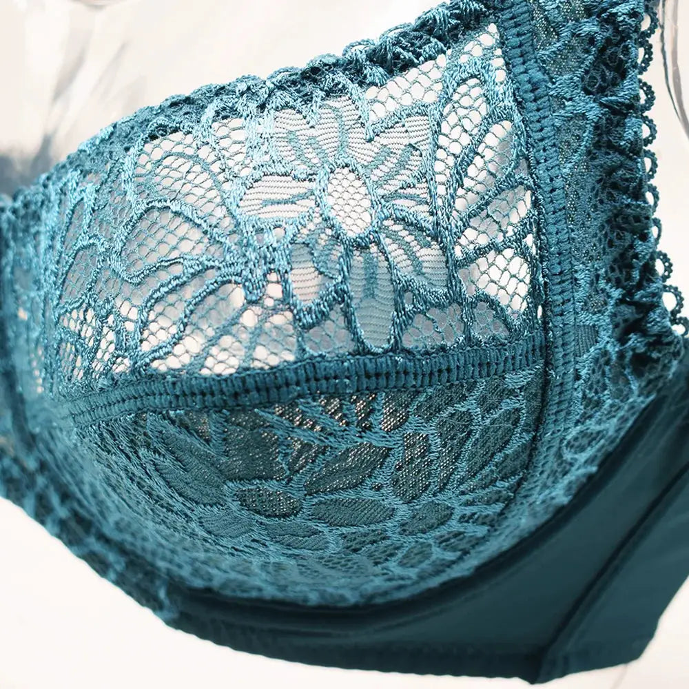 Plus-size teal lace bra with floral sheer mesh cups