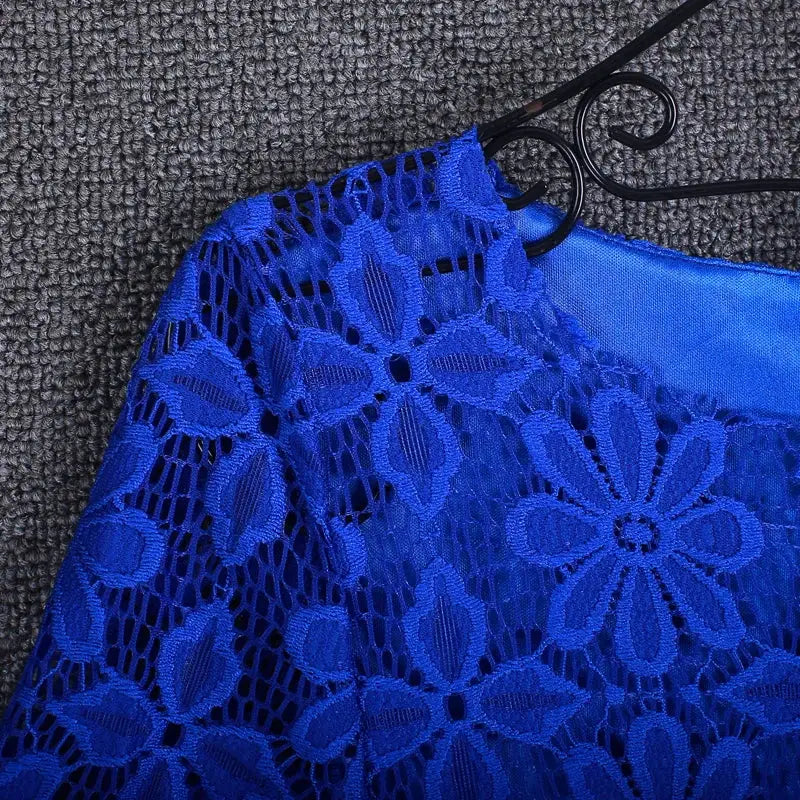 Summer lace blouse for women in royal blue with floral lace pattern and hollow cutouts