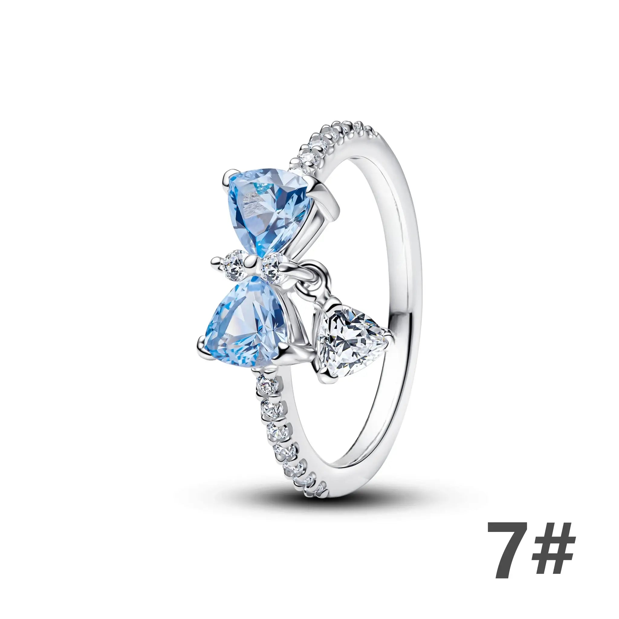 925 silver ring with large blue heart-cut gemstone and pave-set clear stones along the band