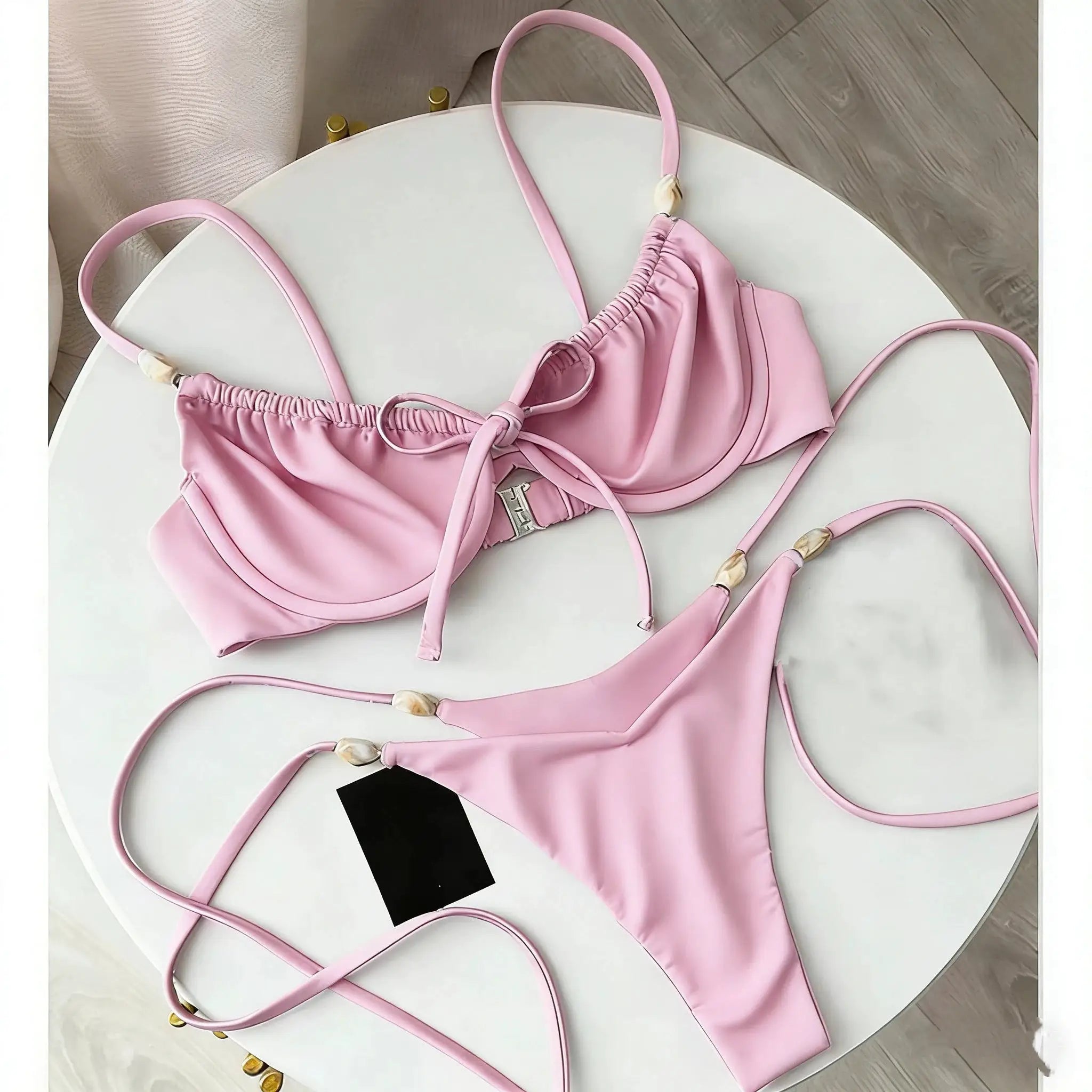 Push-up two-piece bikini set by Simples Market in pink with beaded strap accents