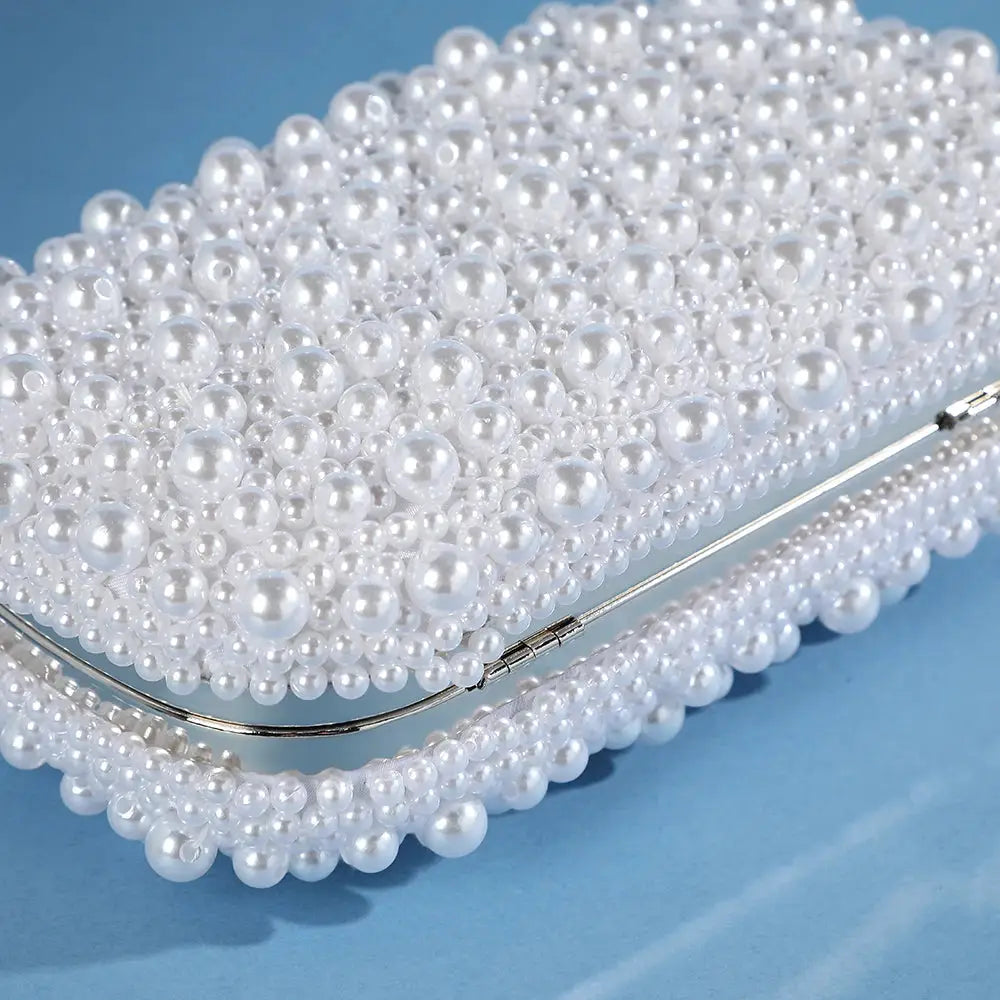 Pearl evening bag clutch with white pearl beads and silver metal frame