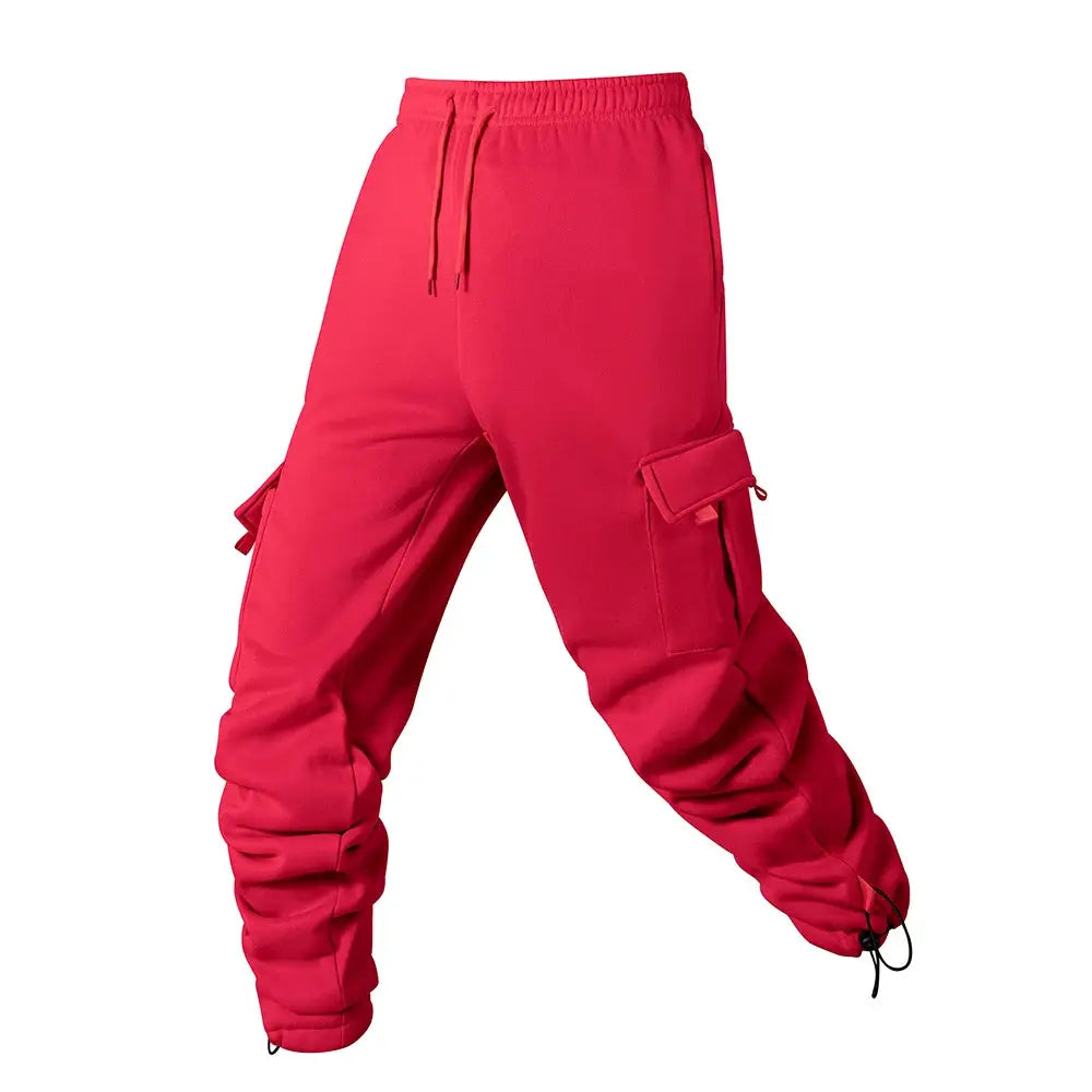 Men's red cargo joggers by Simples Market with drawstring waist, multiple pockets, and ankle cuffs
