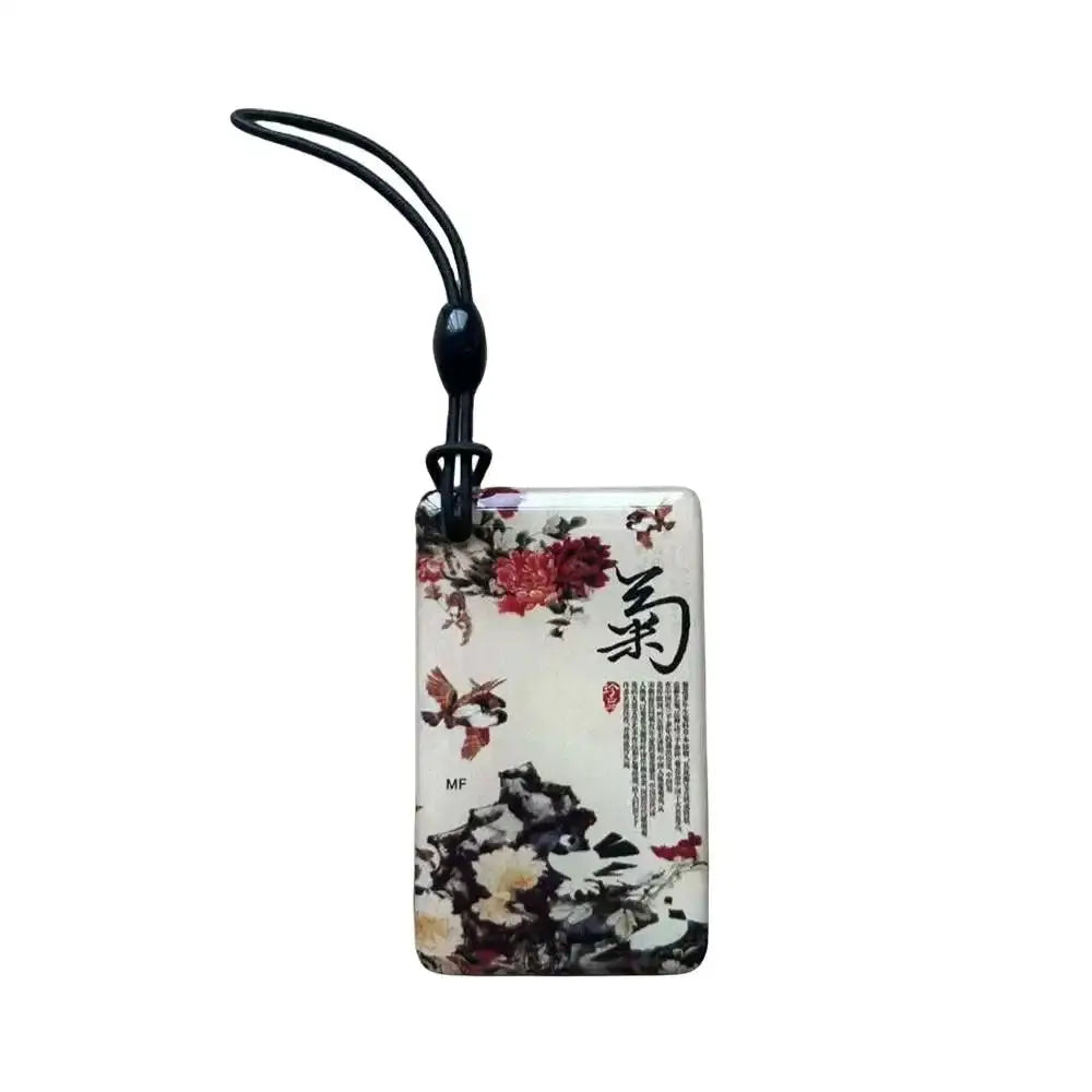 RFID key tag with floral pattern and black lanyard; 13.56MHz UID rewritable NFC, waterproof, Simples Market.