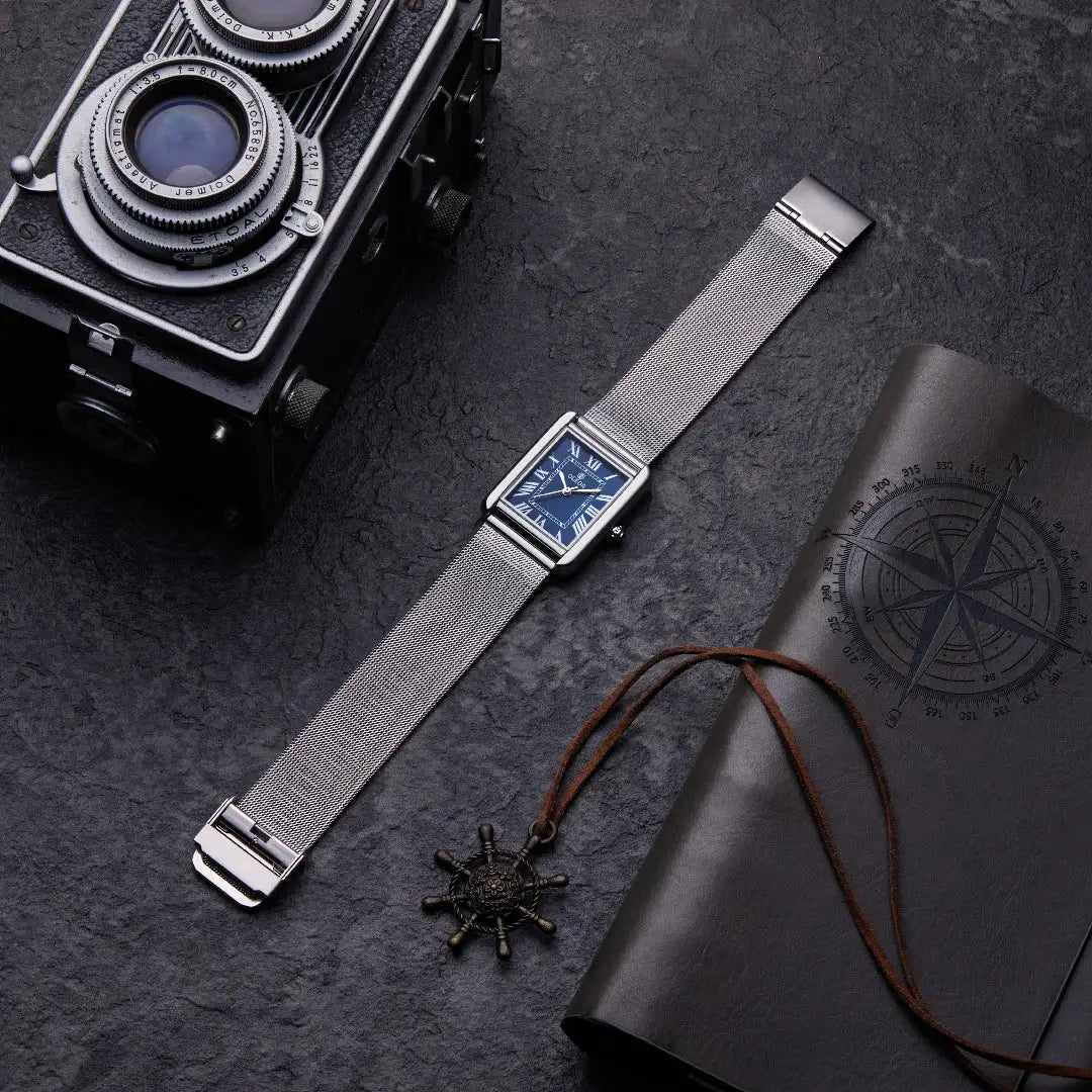 OGEDA waterproof couple watches with stainless steel mesh band and blue square dial.