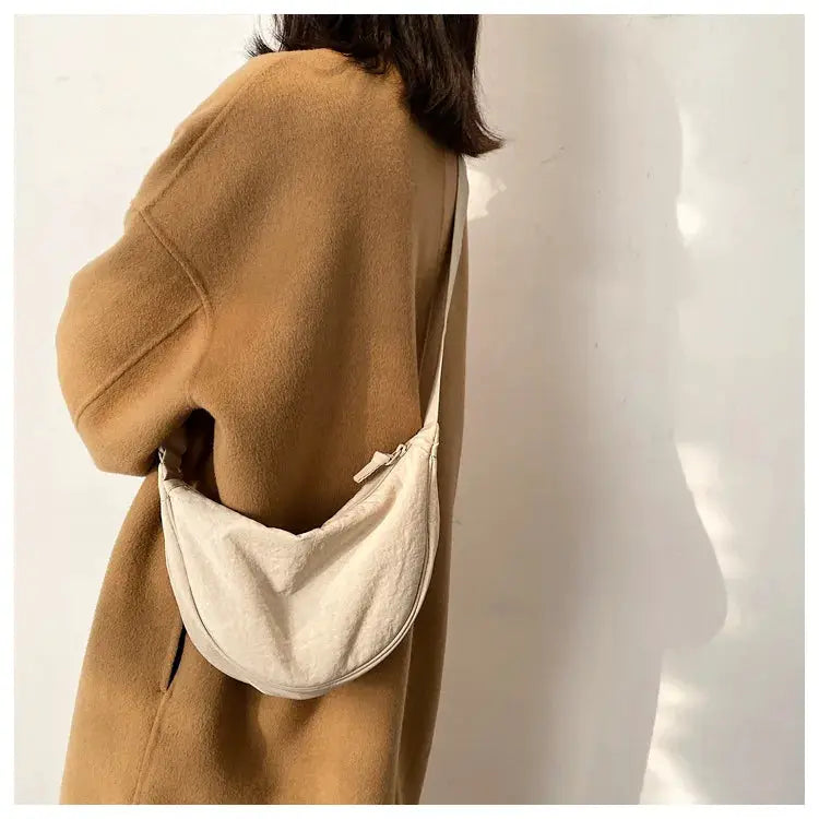 Casual nylon hobo crossbody bag in cream by Simples Market