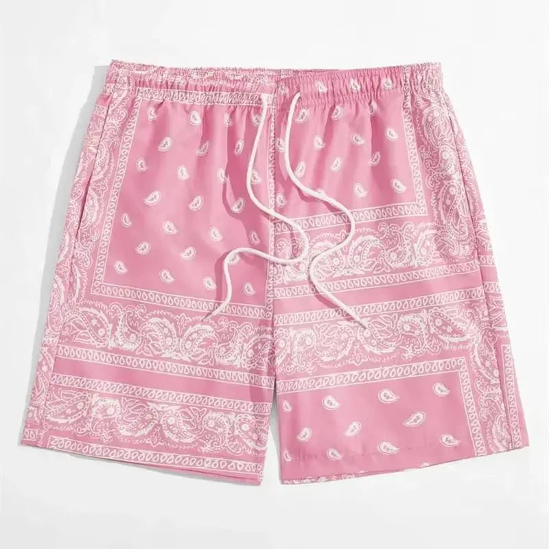 Bandana-patterned men's swim trunks in pink with drawstring waist