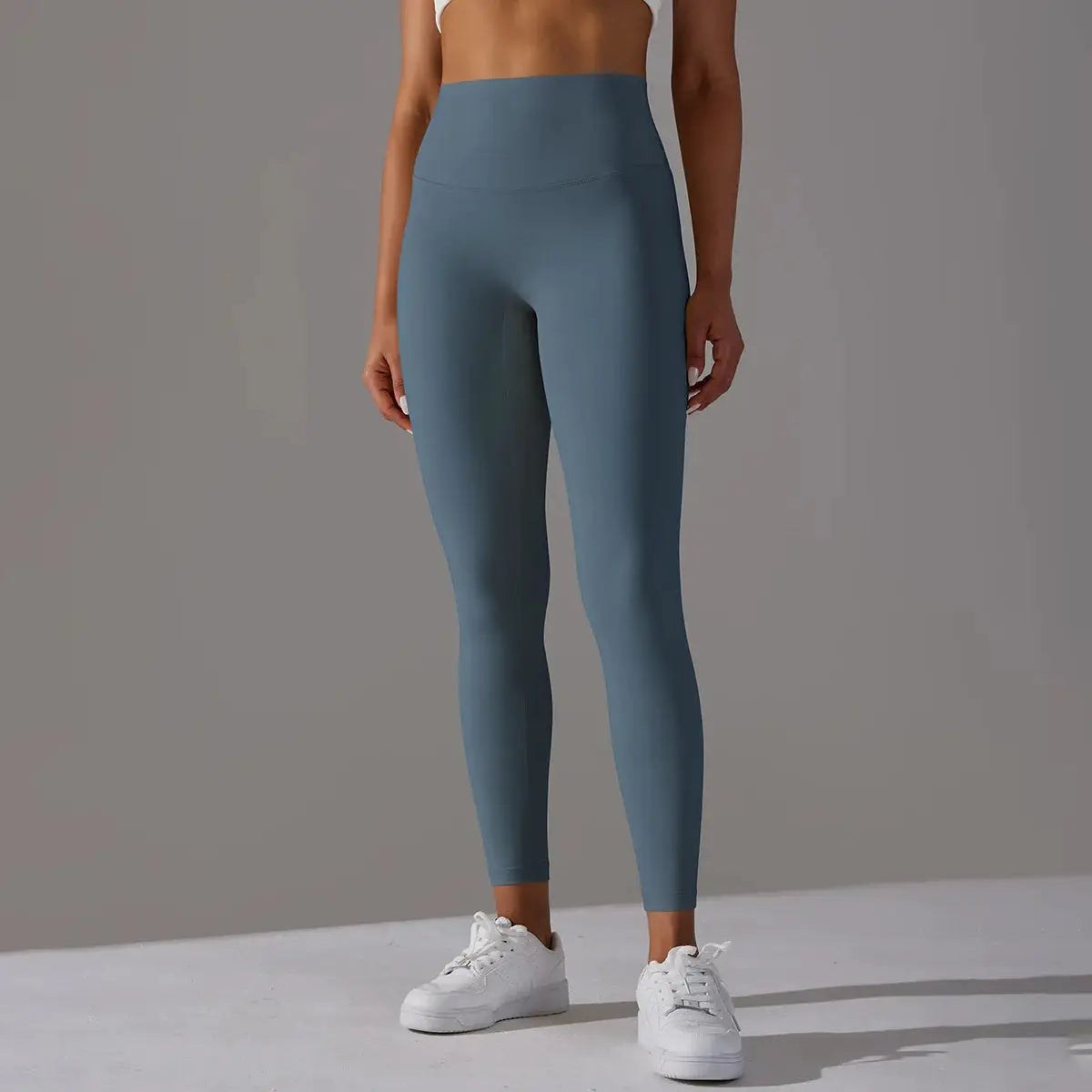 Women's high-waist naked-feeling leggings in blue-gray for fitness, running and yoga