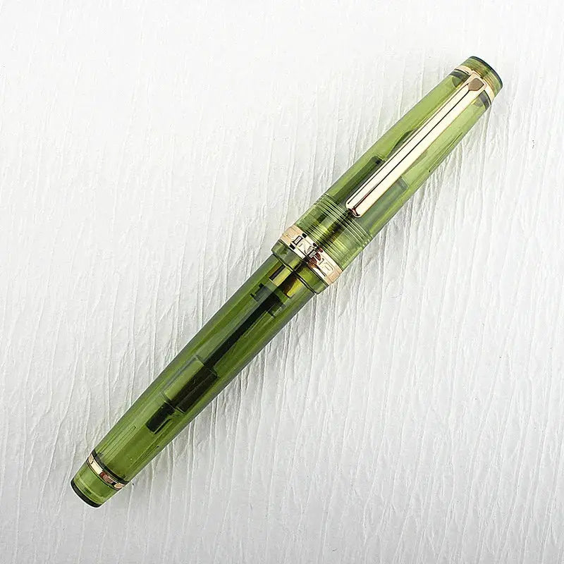Jinhao 82 fountain pen in green acrylic with gold trim and converter