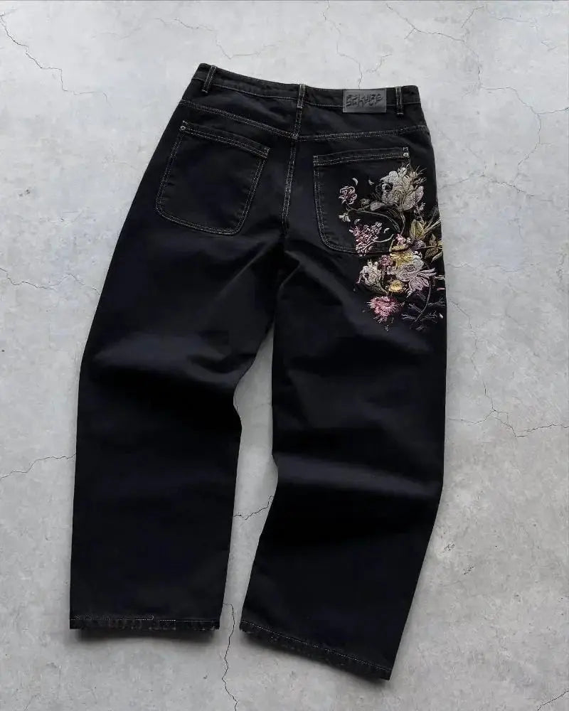 Jeans by Simples Market: black wide-leg denim with cherry blossom embroidery on the right back pocket