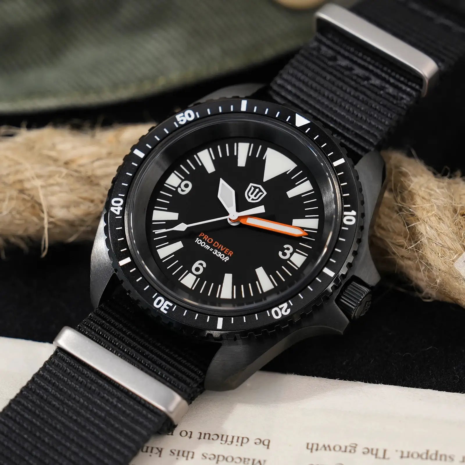 Watchdives WD1980 V3 dive watch on black nylon strap with silver buckle, black dial, white markers, orange minute hand