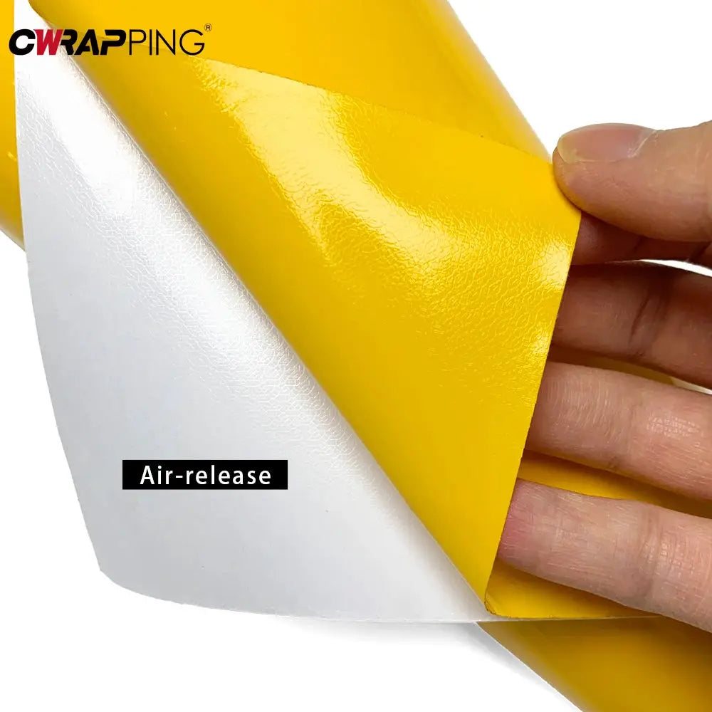 Glossy yellow car wrap vinyl film from Simples Market with waterproof air-release backing.