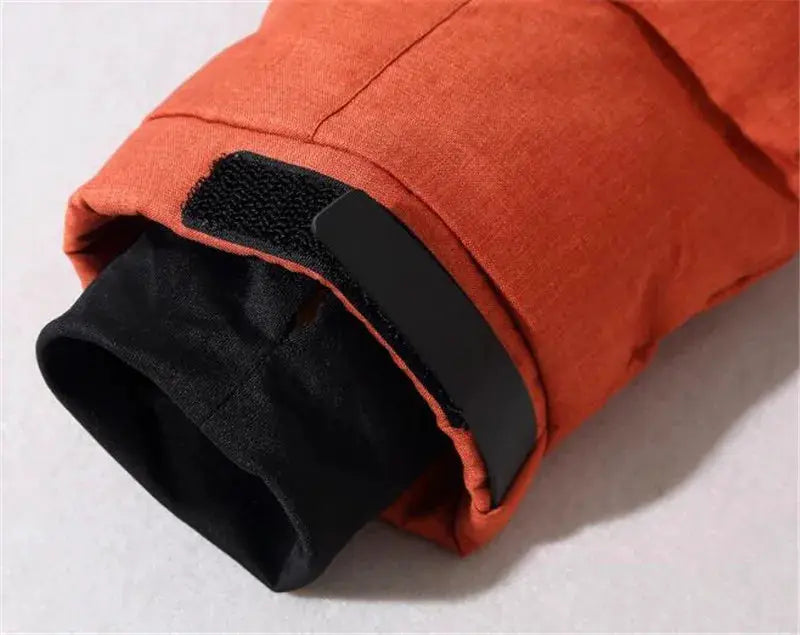 Simples Market orange hooded winter parka sleeve cuff with black interior and Velcro strap