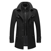 Men's black wool-blend trench coat with high collar, zip-front and button closure, angled pockets.