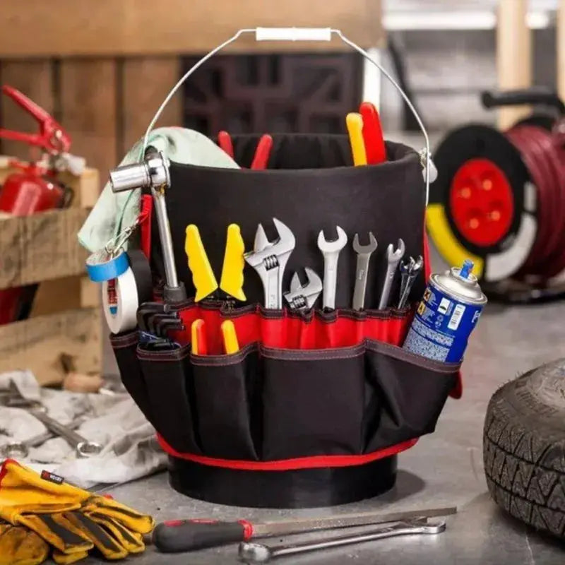 Oxford cloth tool bucket bag with belt slots, black with red trim, loaded with pliers and wrenches
