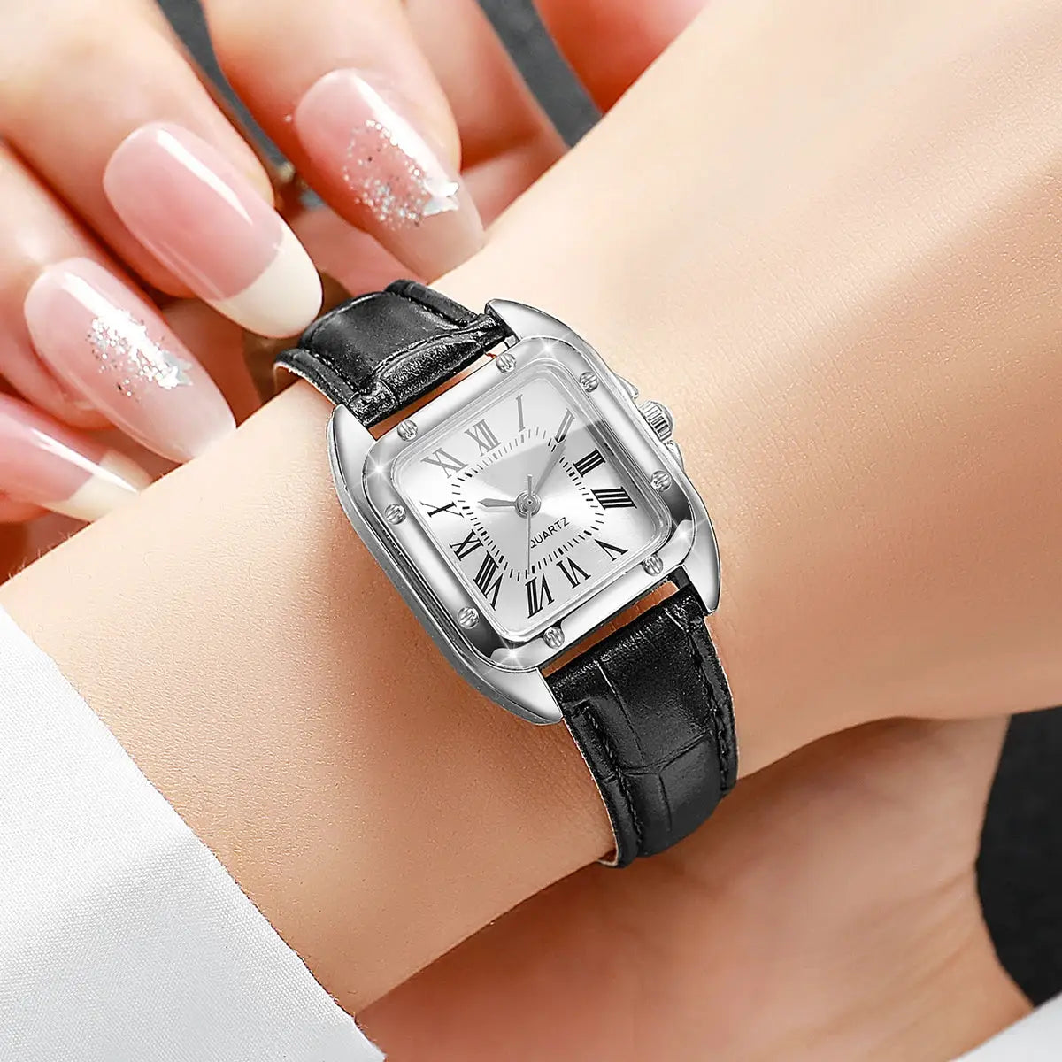Women's square watch with silver-tone case and black leather strap, Roman numeral dial, quartz movement
