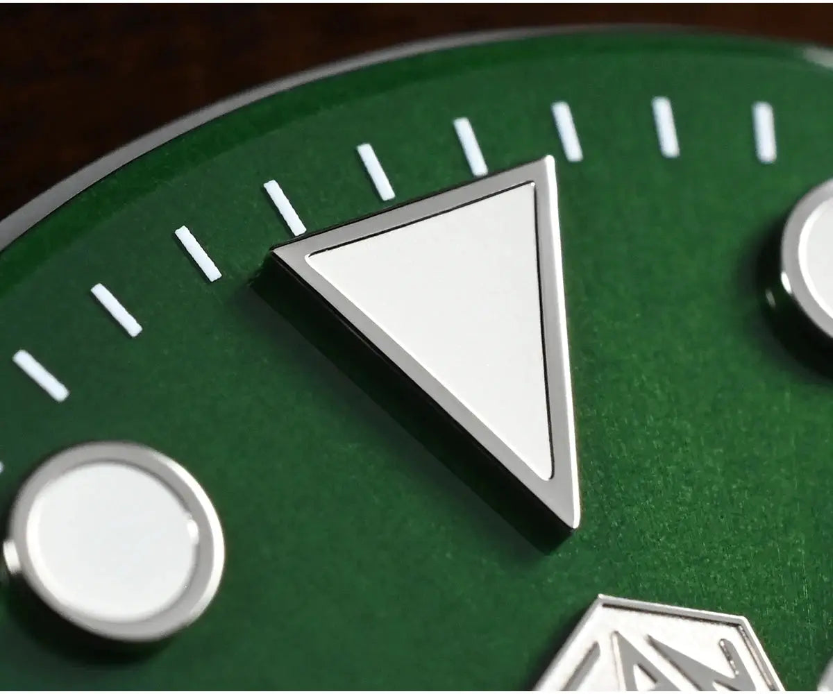 San Martin Water Ghost 40mm diver watch dial close-up; green dial with silver triangular marker and white indices