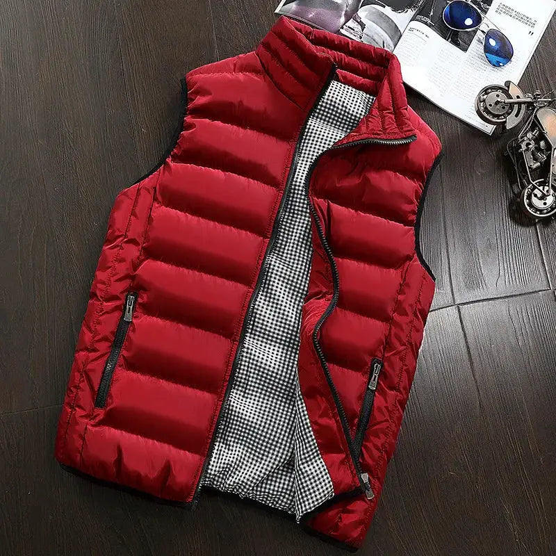 Men's red puffer vest with black zippers, two side pockets, and checkered lining