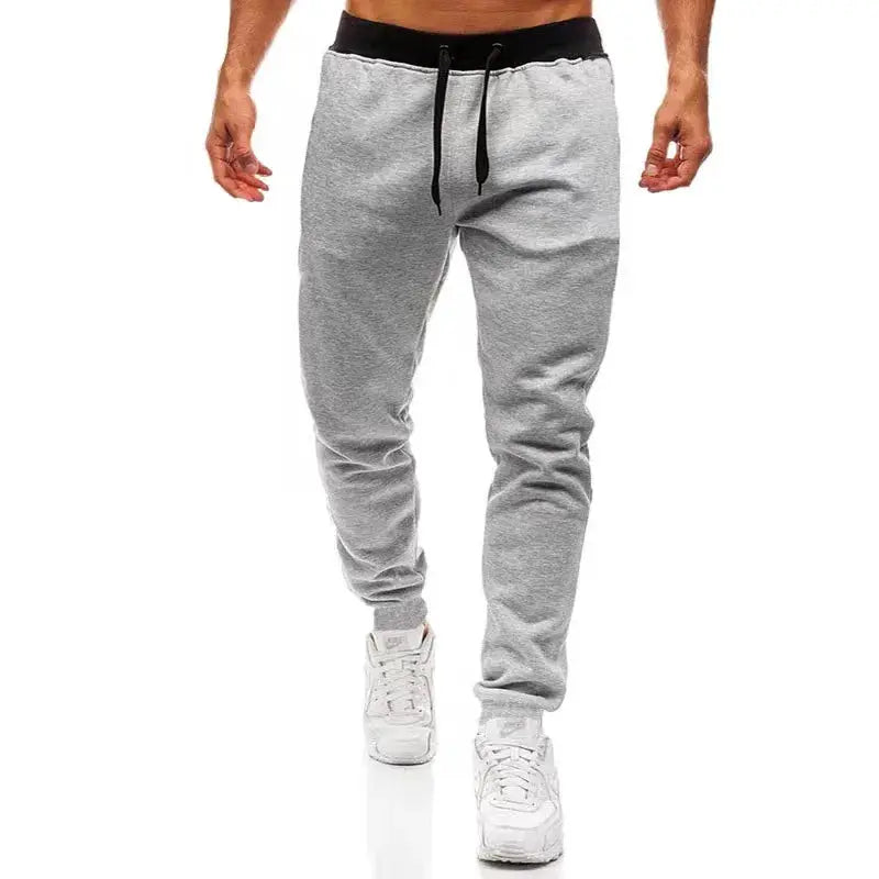 Men's grey joggers with black drawstring waistband, Simples Market gym sweatpants.