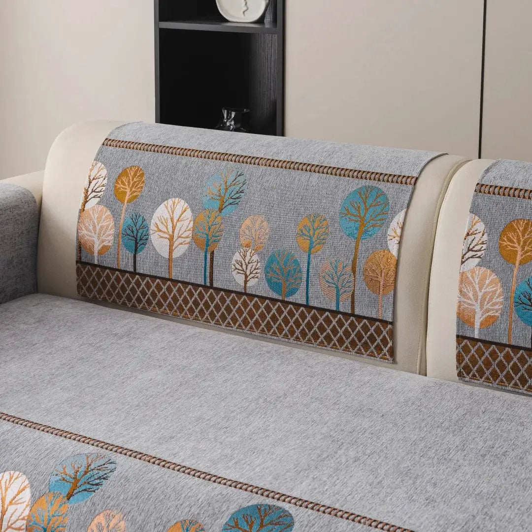 Boho Full Moon Tree jacquard chenille sofa cover in gray with multicolor tree motif; anti-slip protector for living room couch