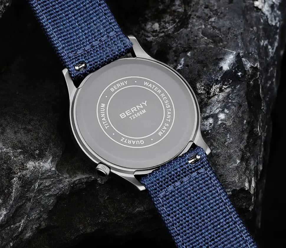 BERNY titanium watch with blue fabric strap; water resistant 5ATM.