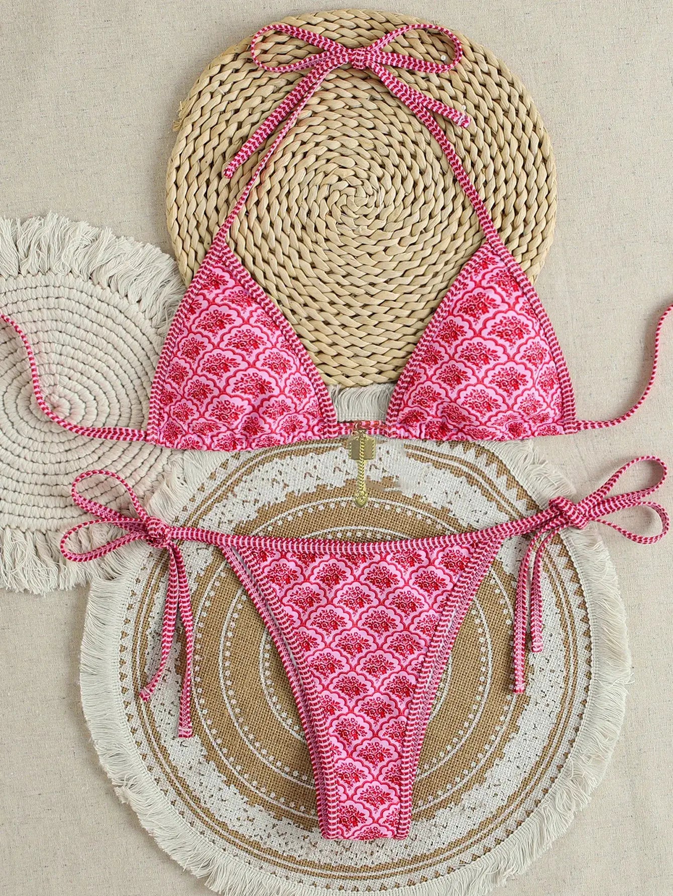 Triangle bikini set by Simples Market, pink floral print with push-up top and Brazilian bottoms.