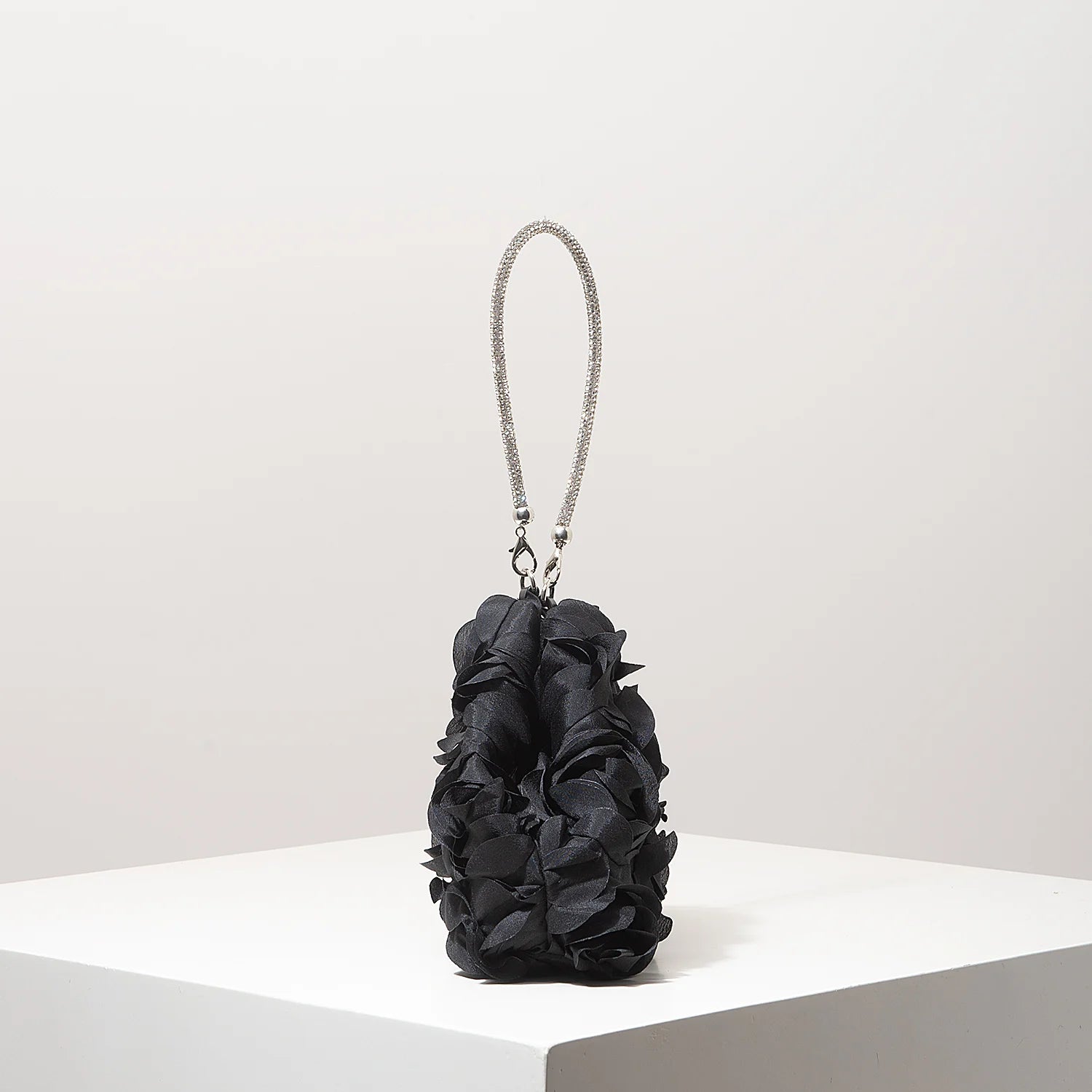 Mini black floral purse by Simples Market with rhinestone chain strap