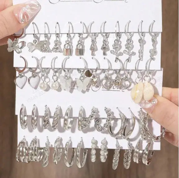 European And American Metal Earrings 24 Piece Set Featuring Pearls Mushrooms Snakes Butterflies And More Fashion Jewelry