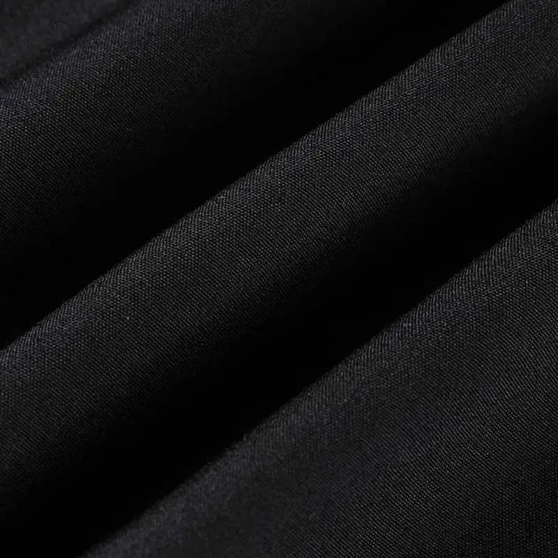 Men's black short-sleeved solid-color shirt fabric close-up
